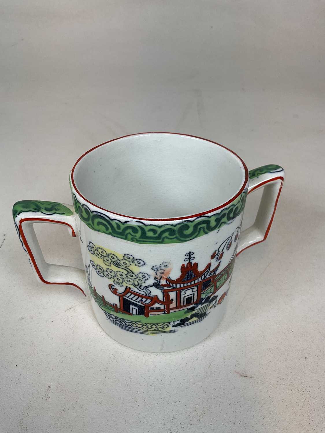 T.G. GREEN & CO LTD; four 'Ming' decorated jugs and a similarly decorated twin handled cup (5). - Image 12 of 14