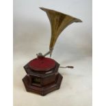A gramophone bearing 'HMV' advertising plaque, sold with a brass horn.