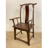 A Chinese throne chair with yoke top rail and swept arms.