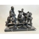 UNATTRIBUTED; a bronze group of five musicians, mounted on a stepped black marble base, 30 x 20cm.