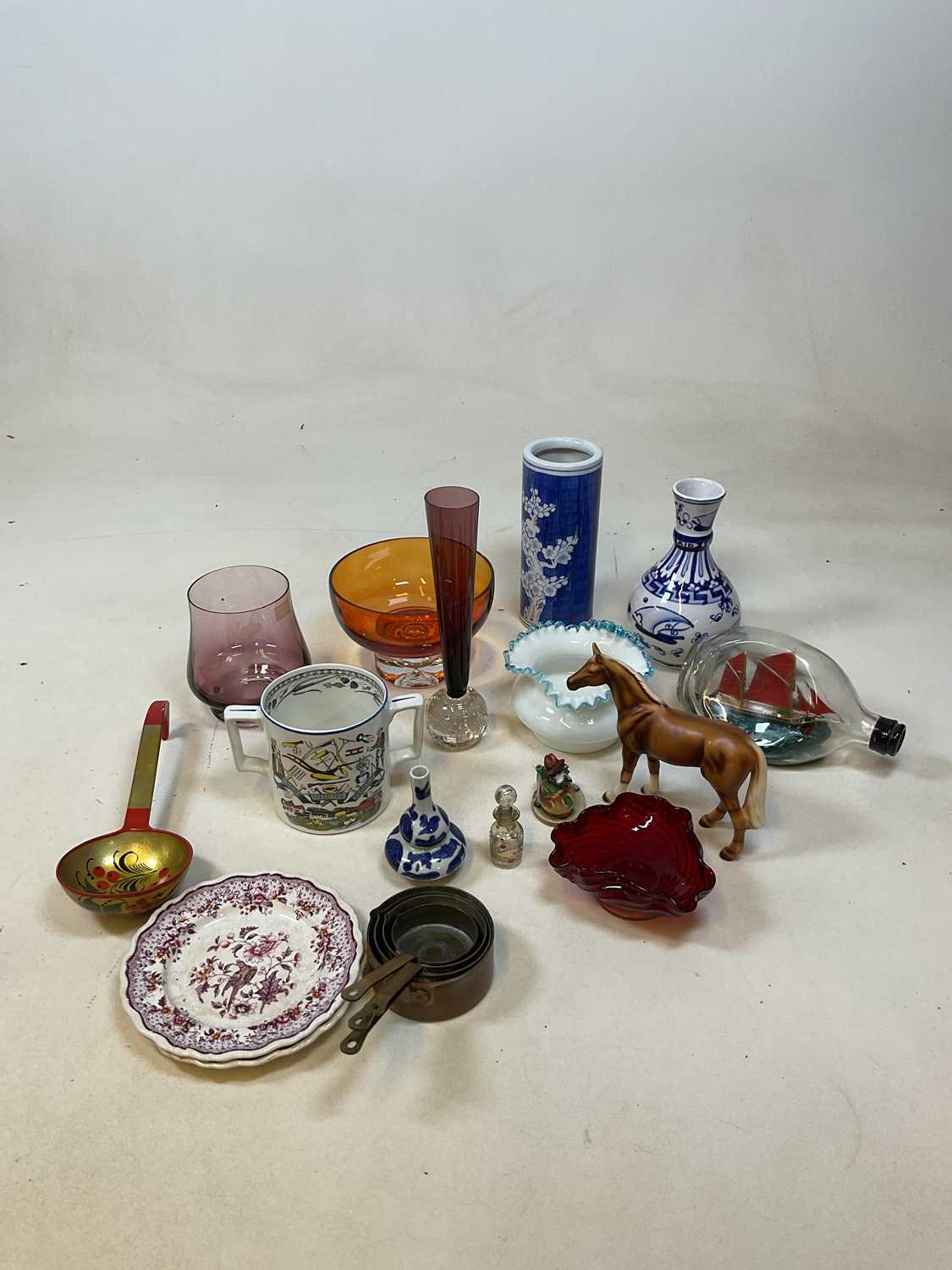 A quantity of decorative ceramics and glass including a modern Chinese sleeve vase.