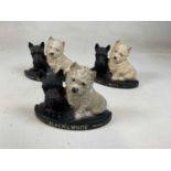 Three plastic Black & White Whisky West Highland/Scottie dog advertising figures, width 27cm.