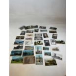 Approximately one hundred and fifty postcards including seaside saucy examples, some greetings,