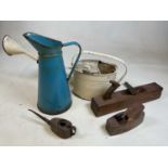 A large blue enamelled jug, a metal watering can, and a oil can (3).