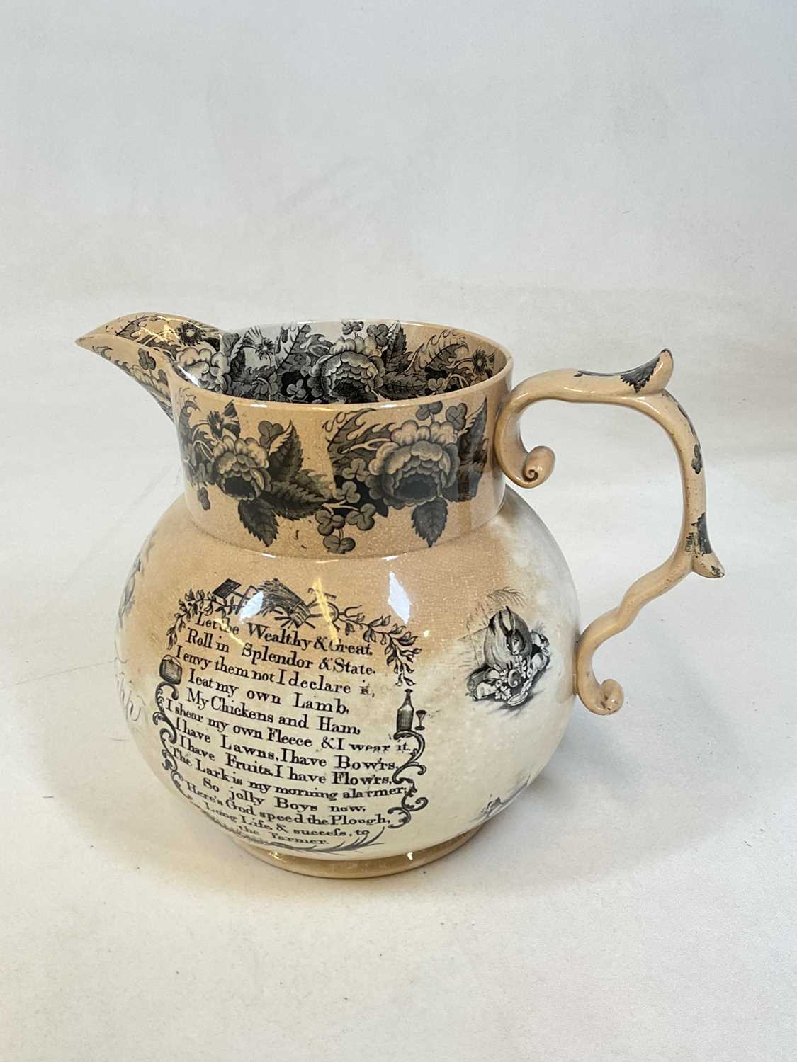 A large mid-19th century transfer decorated marriage jug inscribed 'Abraham & Sarah Tapp 1840',