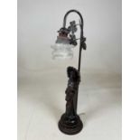 A modern bronze effect figural table lamp, height 64 cm, (shade af) Condition Report: The glass