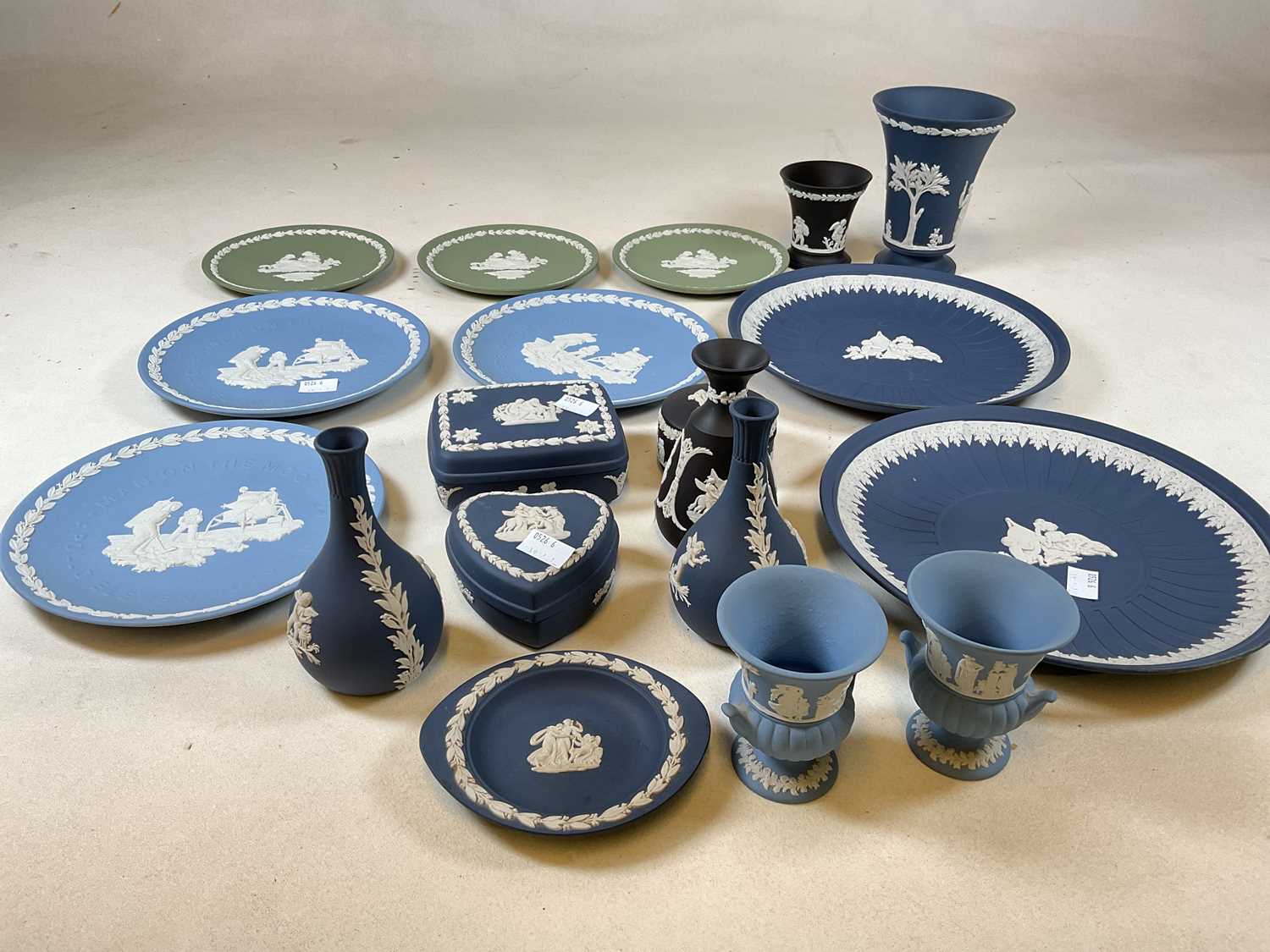 A quantity of Wedgwood jasperware including dark blue, light blue, black and green.