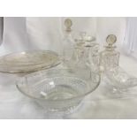 A large collection of decorative glass, predominantly cut glass, including a large Stuart bowl,