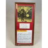CARL PERKINS; an autograph of the legendary music figure mounted with reproduction photograph, 48