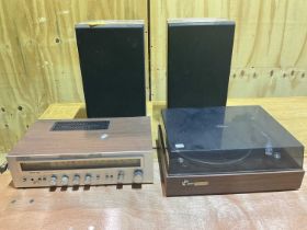 SANSUI; a vintage record player, also an amplifier and two speakers.
