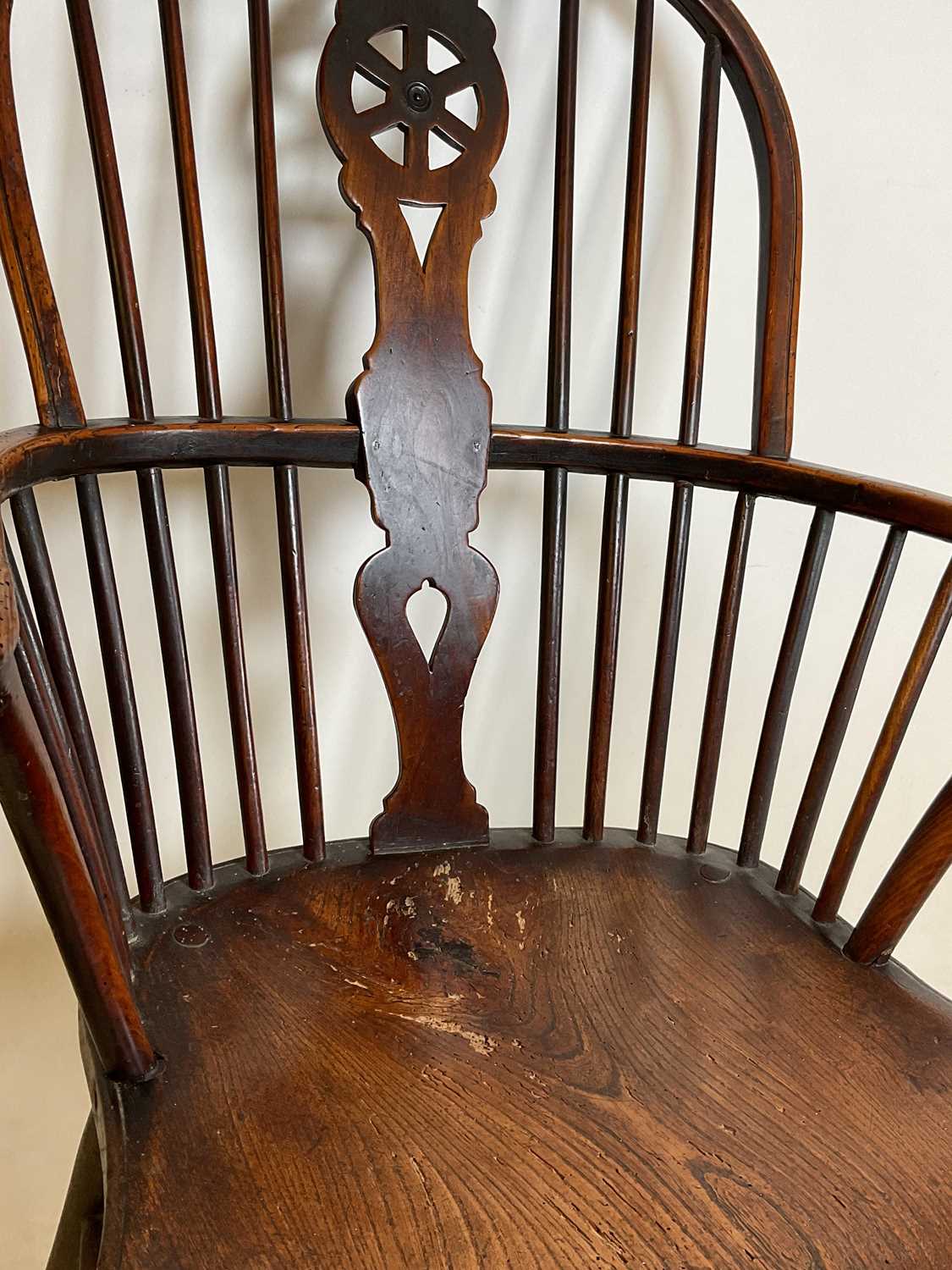 An early to mid-19th century ash and elm hoop back Windsor elbow chair with saddle seat and straight - Image 6 of 7