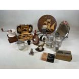 A group of collectors' items including four French storage jars, mincer, coffee grinder, etc.