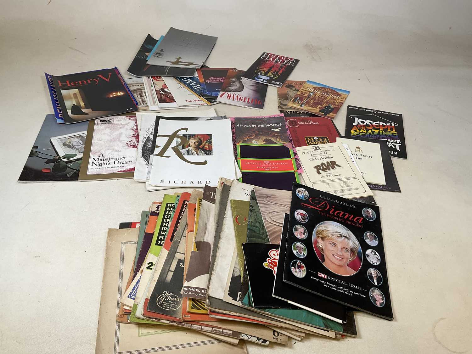 A quantity of vintage theatre programmes and music scores.