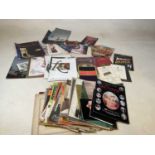 A quantity of vintage theatre programmes and music scores.