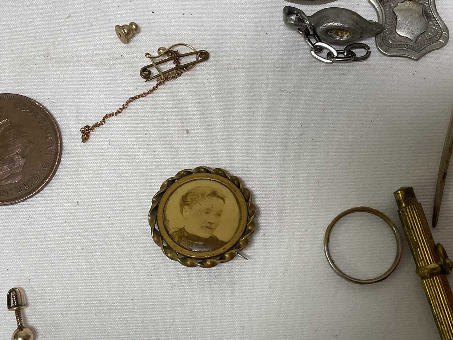 A collection of miscellaneous items to include four silver hallmarked spoons, gold and silver items, - Image 15 of 19