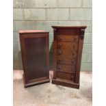 A mahogany Wellington chest and a music cabinet. Wellington Chest; height 107cm, width 51cm ,