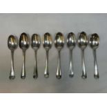 Eight Hallmarked silver table spoons. Weight 500 grams.