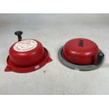 Two vintage painted wall mounted fire bells, one inscribed 'Carter & Co (Nelson) Ltd', diameters