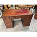 A Victorian mahogany nine drawer twin pedestal desk, height 76cm, width 120cm, depth 63cm.