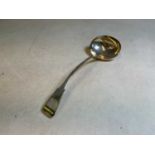 A George III hallmarked silver Fiddle pattern soup ladle, engraved initial to the terminal, maker'