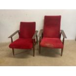 A pair of teak framed 1960s easy chairs.
