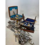 A quantity of silver plated flatware and cutlery, including mahogany cased fish servers, oak cased