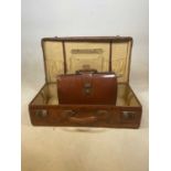 A vintage leather suitcase and a briefcase (2)