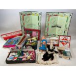 A group of assorted collectors' items to include dolls, Monopoly board games, various sewing and