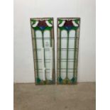 Standard VAT A pair of leaded stained glass Art Nouveau rectangular panels, each 129 x 40cm.