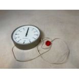 An electric circular Post Office clock, diameter 30cm.