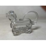 A hand blown German glass decanter in the form of a dachshund, height 18cm, length 25cm.