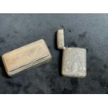 A 19th century French snuff box of rounded rectangular form with vacant cartouche to the hinged lid,