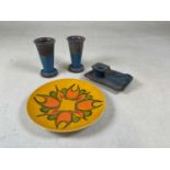 Denby Danesby ware; a pair of vases and a candle holder, also a Poole pottery 'Delphis' plate.