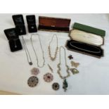 A small group of costume jewellery, including a leather cased pearl necklace inscribed 'Yohami