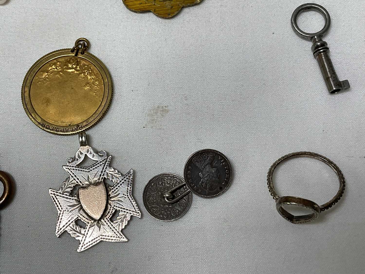 A collection of miscellaneous items to include four silver hallmarked spoons, gold and silver items, - Image 13 of 19