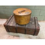 A large strap bound trunk and a plywood hat box (2)