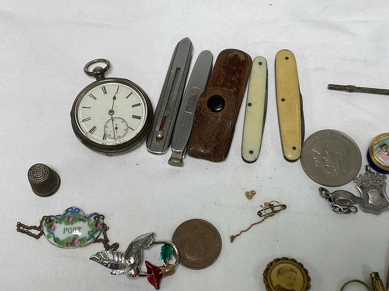 A collection of miscellaneous items to include four silver hallmarked spoons, gold and silver items, - Image 18 of 19