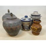 Two West German Rumtopf storage jars and covers, a West German vase, and two lamp bases (5)