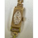 UNO; a lady's vintage gold wristwatch with 14ct yellow gold watch head and 9ct yellow gold bracelet,