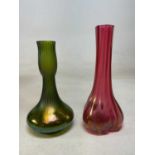 A Kralik Gloria iridescent green glass vase, height 22cm, and another example in cranberry, height