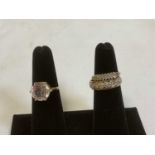 A 9ct yellow gold dress ring, size O, approx. 1.44g, a 10ct yellow gold ring with six claw set clear