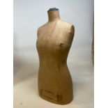 A Siegel & Stockman, Paris tailor's female mannequin with linen cover, height 85cm.