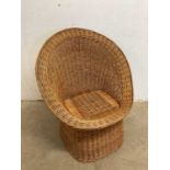 ASomerset willow tub chair, height of back 82cm, seat height 38cm.