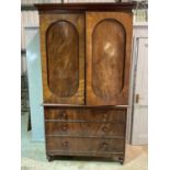 A 19th century mahogany linen press with two short over three long drawers, height 230cm, width