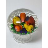 SAINT LOUIS; a paperweight 'Piedouche Basket of Fruit on White Latticino Base', numbered 185 from