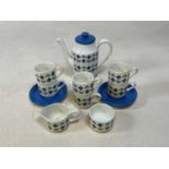 MIDWINTER; a 'Roselle' coffee set, comprising coffee pot, cream jug, sugar bowl and six cups and