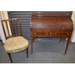 H MAWER & STEPHENSON, LONDON; an early 19th century mahogany writing table with satinwood