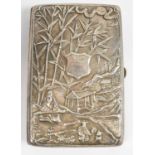 A Chinese export silver card case with ornate relief decoration, inscribed to front cartouche and