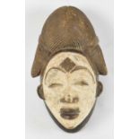 TRIBAL ART; a Gabon Punu-Lumbo mask with white pigmentation, height 28cm.