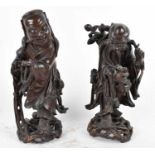 A pair of Chinese carved wooden figures (one af), height of tallest approx 32cm.Condition Report: